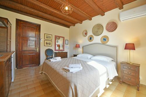 Katil atau katil-katil dalam bilik di Athina Guesthouse