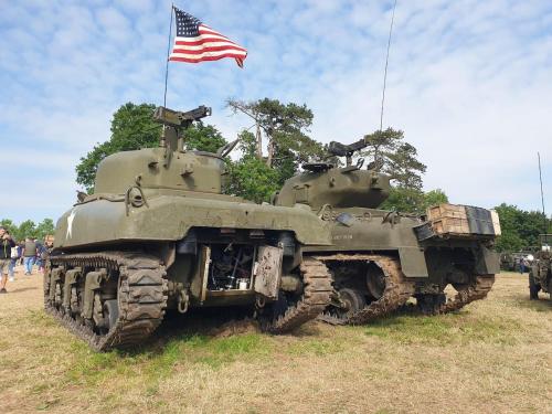 a tank with an american flag on top of it at Maison de Famille face à l'église in Sainte-Mère-Église