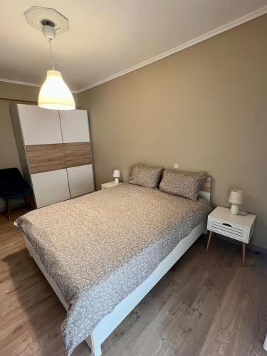 Katil atau katil-katil dalam bilik di Airy apartment