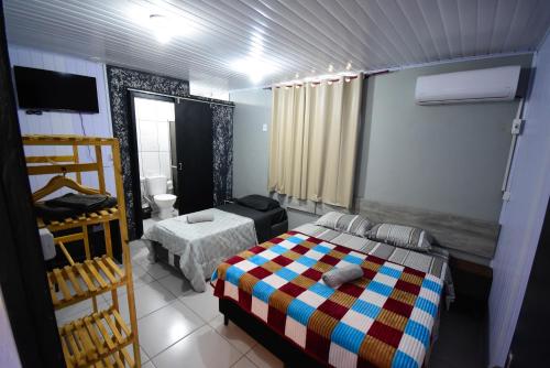 Katil atau katil-katil dalam bilik di Hotel Pousada Roma