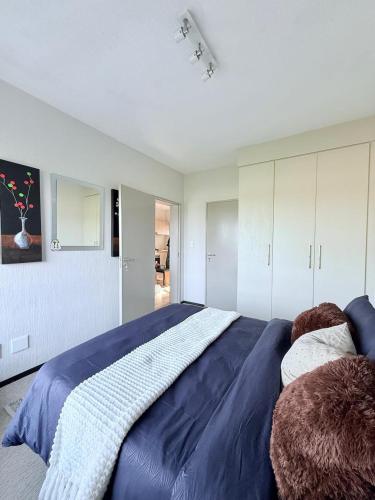 Postel nebo postele na pokoji v ubytování Dream Orchards Broadacres Apartment