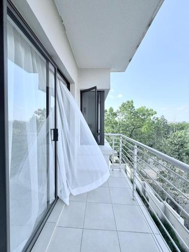 Balkón nebo terasa v ubytování Dream Orchards Broadacres Apartment