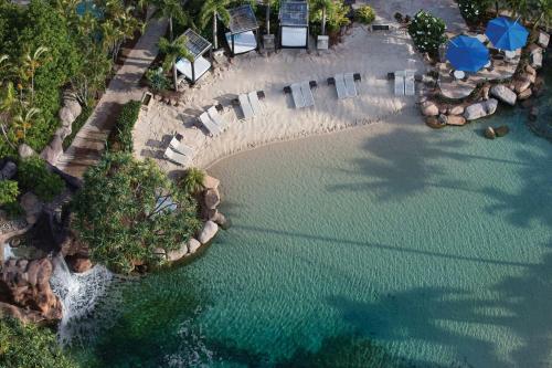 an overhead view of a pool with chairs and water at Marriott Vacation Club at Surfers Paradise in Gold Coast