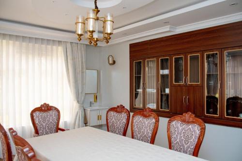 Ένα ή περισσότερα κρεβάτια σε δωμάτιο στο NearEden elegant Home