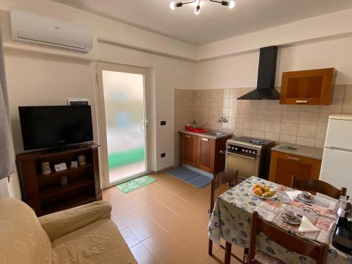 Kuchyň nebo kuchyňský kout v ubytování Appartamento di Mare