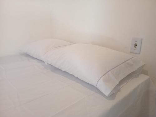 Ein Bett oder Betten in einem Zimmer der Unterkunft Quarto para 4 a 900 metros da Vila do Capão