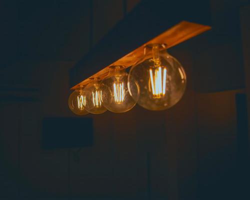 a group of lights hanging from a ceiling at White Lake Apartments City Center Ohrid,Lakeside in Ohrid