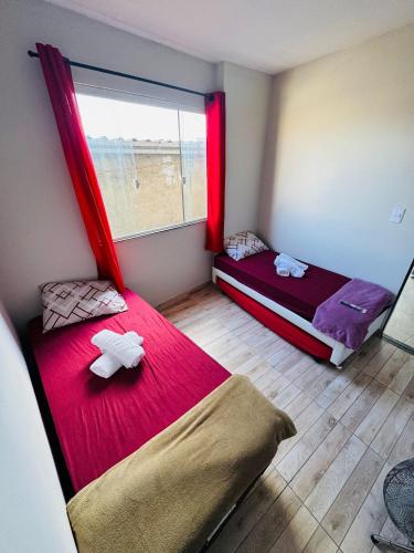 Ένα ή περισσότερα κρεβάτια σε δωμάτιο στο Edícula Privativa e Confortável de Fácil Acesso - Retiro VR RJ