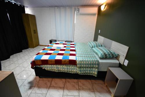 Katil atau katil-katil dalam bilik di Hotel Pousada Roma