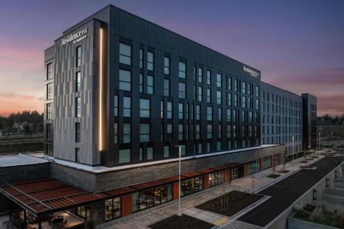 a rendering of a large building in a city at Residence Inn by Marriott Seattle Northgate Station in Seattle