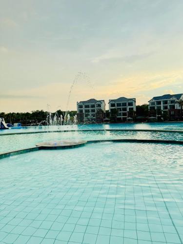 a fountain in the middle of a pool at 126Theblyde in Pretoria