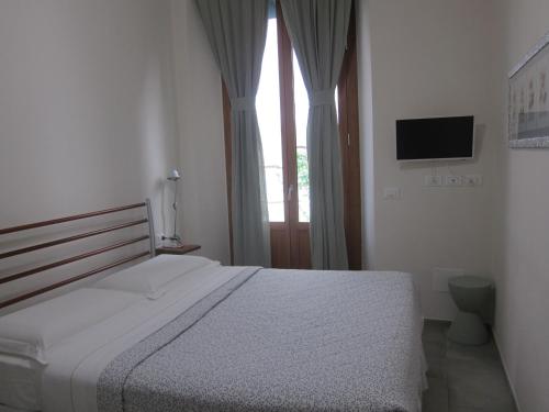 Postel nebo postele na pokoji v ubytování A casa di Enrico e LuzMe