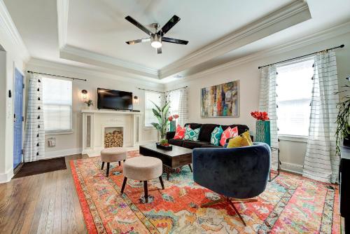 a living room with a couch and a chair at Gatewood Getaway-City card 4 local biz discounts in Oklahoma City
