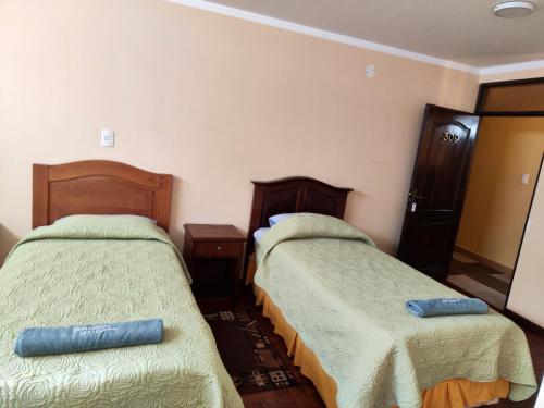 Ένα ή περισσότερα κρεβάτια σε δωμάτιο στο Hotel Benelux