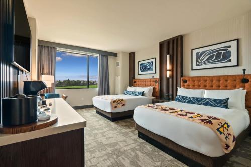 Postel nebo postele na pokoji v ubytování Spokane Tribe Resort and Casino