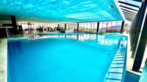 Bazén v ubytování Gran paradiso resort Campos do jordão nebo v jeho okolí