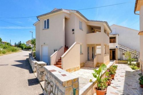 Apartments with parking spaces Novalja, Pag - 23663