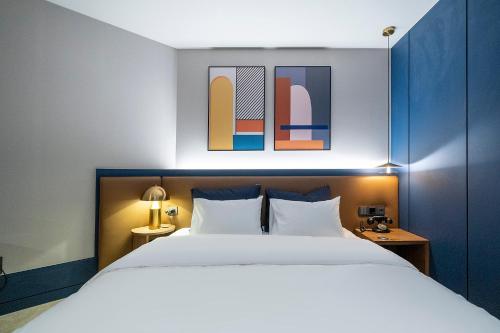 Letto o letti in una camera di Hotel Classy