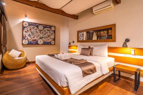Una cama o camas en una habitación de Coco Lodge