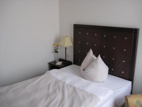 Ένα ή περισσότερα κρεβάτια σε δωμάτιο στο Best Western Soibelmanns Lutherstadt Wittenberg