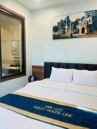Ένα ή περισσότερα κρεβάτια σε δωμάτιο στο Tam Coc Guest House One & Hotel Ninh Binh