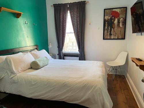 Ένα ή περισσότερα κρεβάτια σε δωμάτιο στο Barefoot Inn