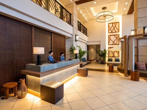 Posezení v ubytování Kafuu Resort Fuchaku Condo Hotel