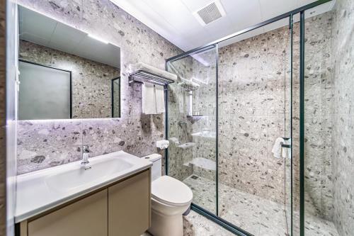 Kúpeľňa v ubytovaní Oak Hotel Chengdu Jiuyanqiao Chuanyin Branch