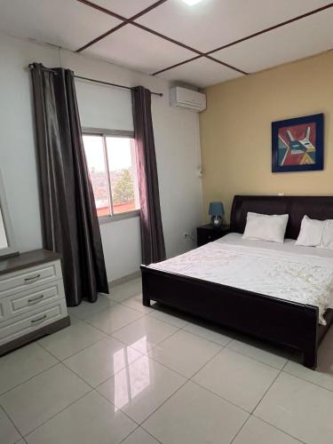 Postel nebo postele na pokoji v ubytování Duplex Haut Standing ODZA