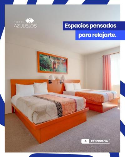 Кровать или кровати в номере Hotel Azulejos