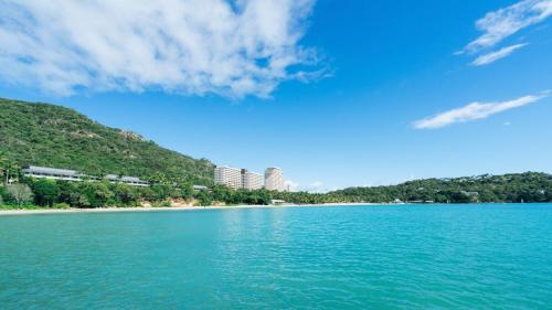 a view of the beach from a boat in the water at Beachfront Hamilton Island in Hamilton Island