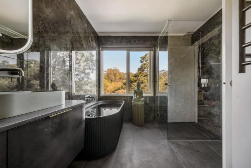 Koupelna v ubytování Boatshed Villas by Istana - Green Door