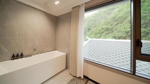 Galería fotográfica de Xingfu Farm Resort en Zhangjiajie