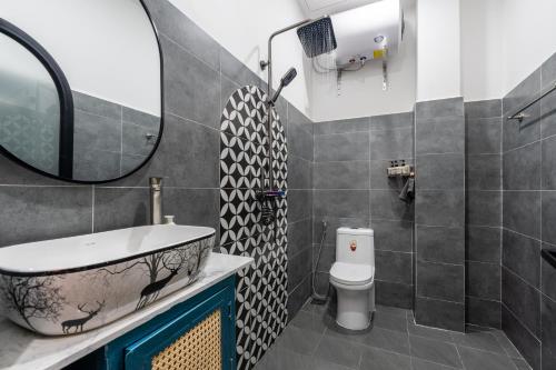 Ένα μπάνιο στο Central Hoi An Villa