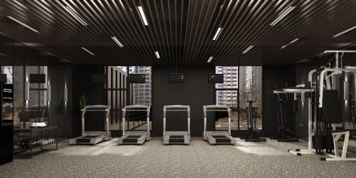a gym with several exercise bikes in a room at Eastern House Xi'an in Xi'an