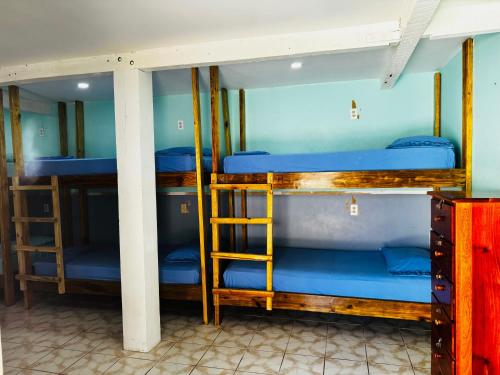Μία ή περισσότερες κουκέτες σε δωμάτιο στο Go Slow Hostel