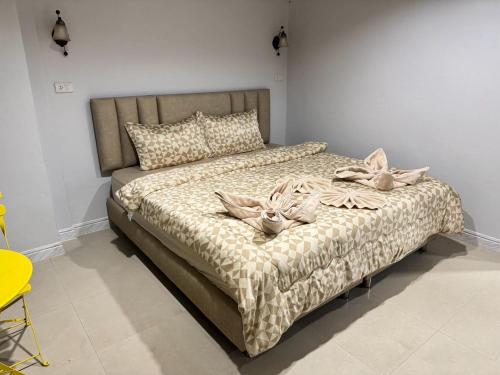 Postel nebo postele na pokoji v ubytování Miley Guesthouse
