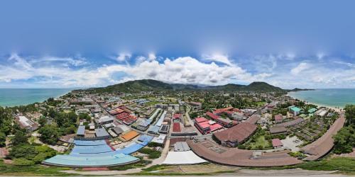 an aerial view of a city next to the ocean at Bonny Hotel 4 Floors No Elevator in Lamai
