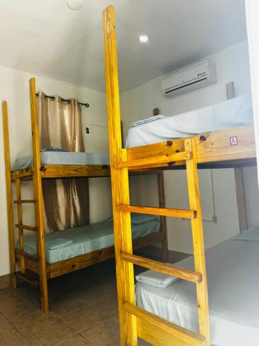 Μία ή περισσότερες κουκέτες σε δωμάτιο στο Go Slow Hostel