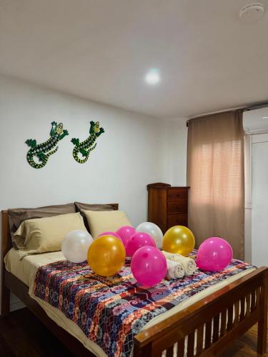 Ένα ή περισσότερα κρεβάτια σε δωμάτιο στο Go Slow Hostel