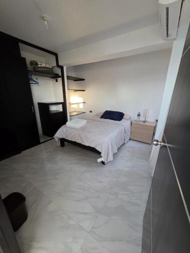 Ένα ή περισσότερα κρεβάτια σε δωμάτιο στο Departamento cómodo y privado en Paraíso