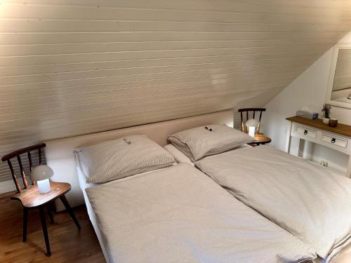 Katil atau katil-katil dalam bilik di Ferienhaus Leitner