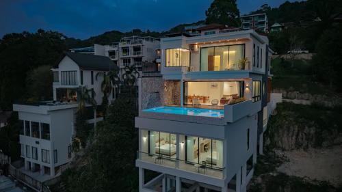 an aerial view of a building at night at Luxury Seaview Villa in Patong - Villa Yona in Patong Beach