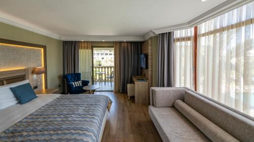 Postel nebo postele na pokoji v ubytování Samara Hotel Bodrum Ultra All Inclusive
