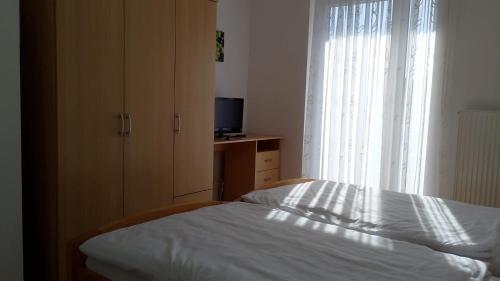 Katil atau katil-katil dalam bilik di Hotel Zum Rebstock