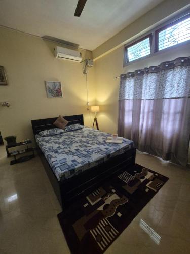 Cama o camas de una habitación en Reeha'r Aashray inn - 'A 1BHK personal home'