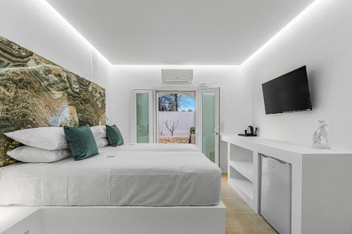 Кровать или кровати в номере VILLA K, Boutique Hotel