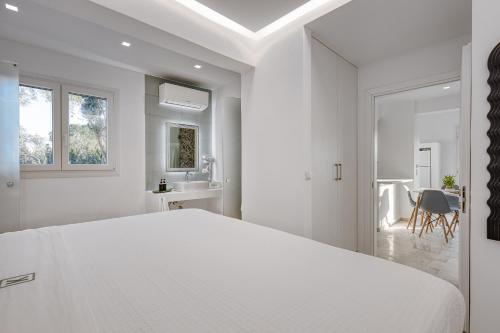 Кровать или кровати в номере VILLA K, Boutique Hotel