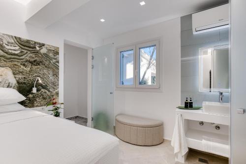 Кровать или кровати в номере VILLA K, Boutique Hotel