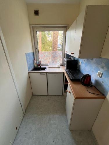 Dapur atau dapur kecil di Domki Sosnówka